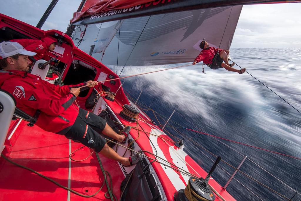February 25, 2015. Leg 4 to Auckland onboard Dongfeng Race Team. Day 17. Kevin Escoffier inspects the leech line on the MH0. Volvo Ocean Race 2014/15 ©  Sam Greenfield / Volvo Ocean Race