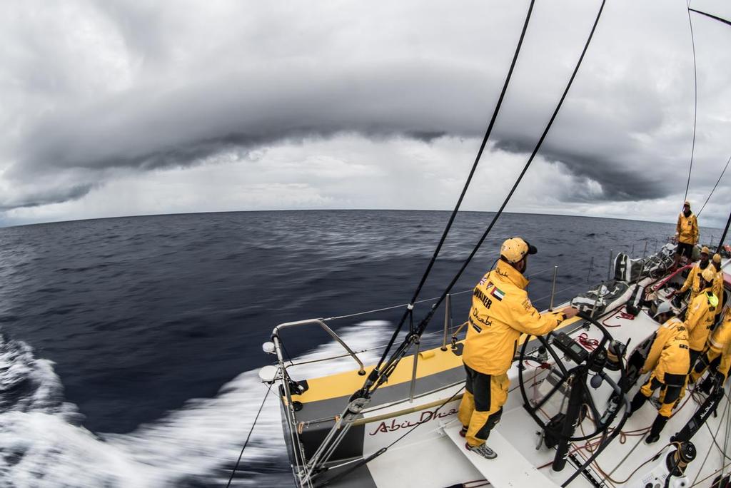 February 26, 2015. Leg 4 to Auckland onboard Abu Dhabi Ocean Racing. Day 18.  Riding the front downdraft from a massive wall cloud, Ian Walker drives Azzam to windward around Dongfeng 4 nm away en route to Auckland. Volvo Ocean Race 2014-15 photo copyright Matt Knighton/Abu Dhabi Ocean Racing taken at  and featuring the  class