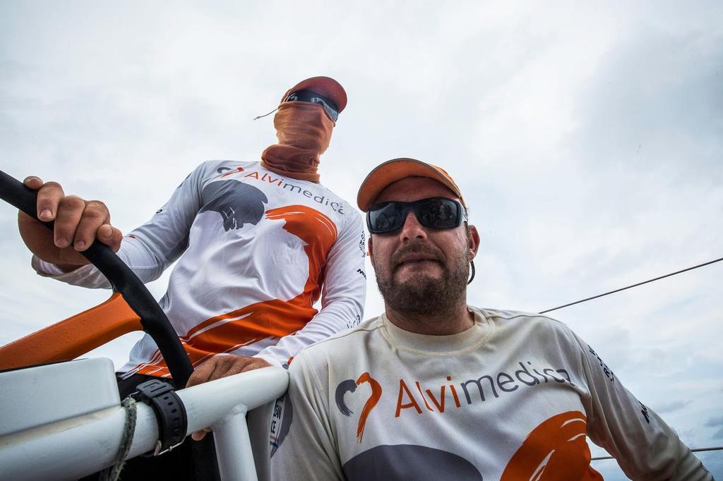 February 25, 2015. Leg 4 to Auckland onboard Team Alvimedica. Day 17. The straight line drag-race to Auckland enters its first full day with the rich only getting richer at the front of the line--always sailing into the stronger winds first. Kiwis Ryan Houston (R) and Dave Swete (L) look ahead towards their home country of New Zealand. Volvo Ocean Race 2014-15 ©  Amory Ross / Team Alvimedica