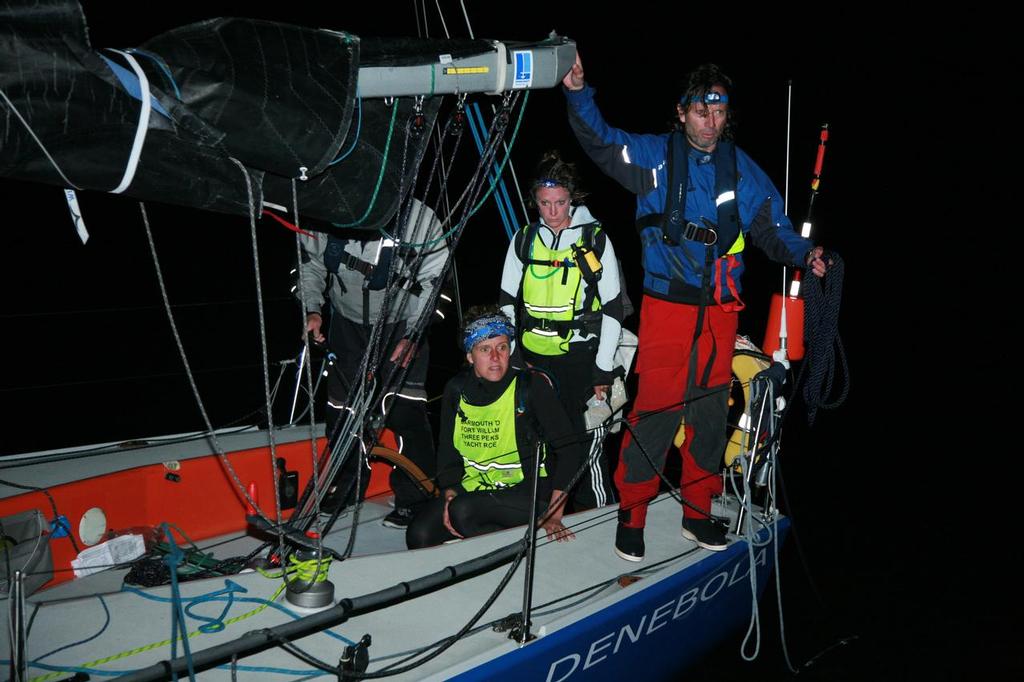 Runners prepare to disembark at night at Caernfaron - Three Peaks Yacht Race photo copyright Rob Howard taken at  and featuring the  class