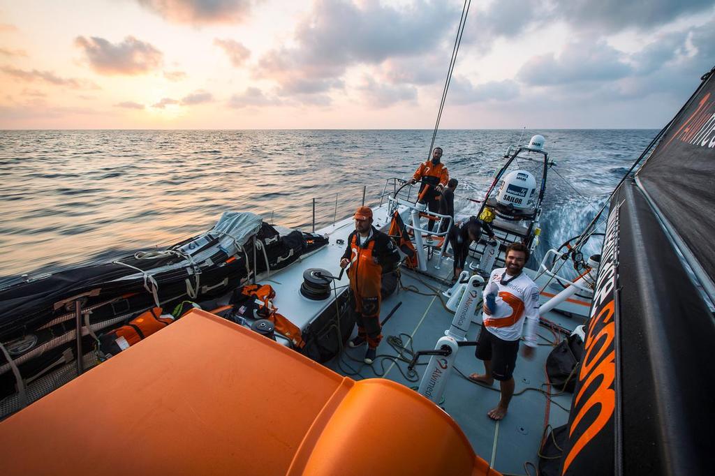 January 27, 2015. Day 24 of Leg 3 to Sanya, onboard Team Alvimedica. The final 50 miles to Sanya are spent in a building breeze at sunrise with Mapfre and Brunel in hot pursuit, just 8 miles astern. A beautiful last sunrise of Leg 3. ©  Amory Ross / Team Alvimedica