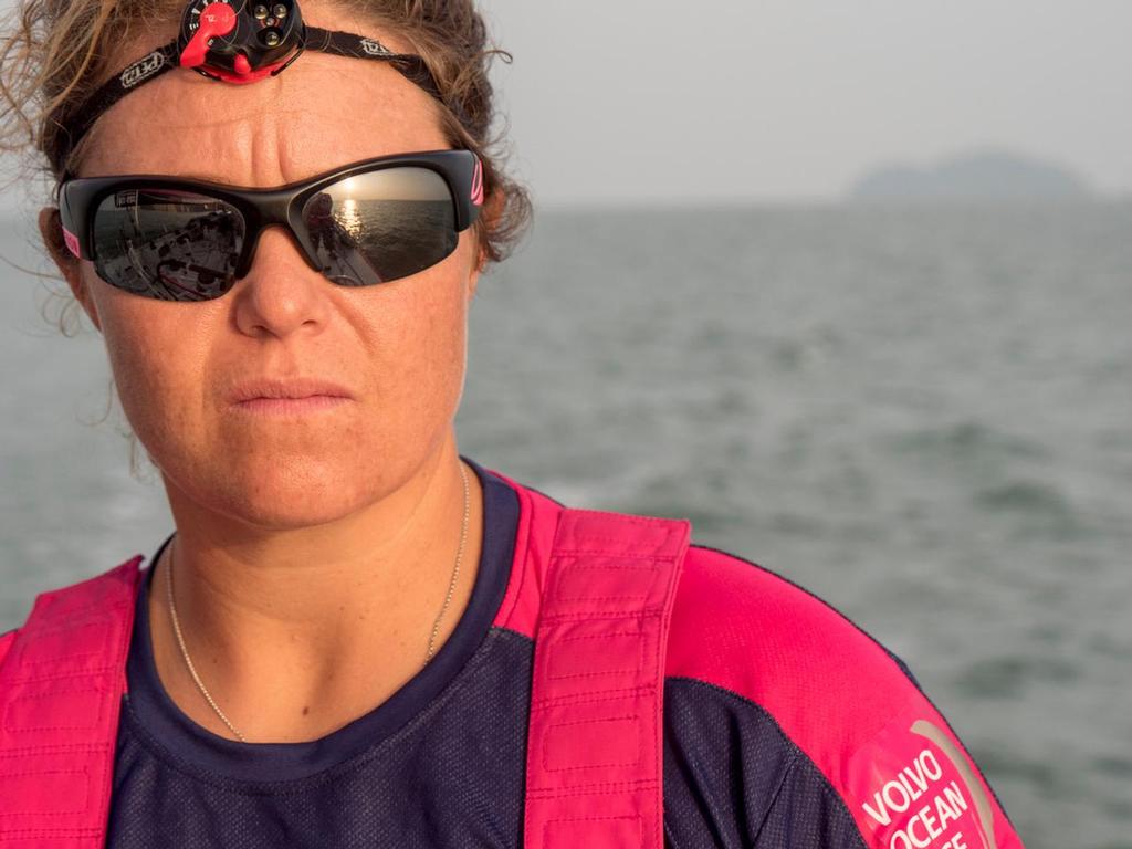 January 21, 2015. Day 18 of Leg 3 to Sanya, onboard Team SCA. Sally Barkow wearing her prescription Kaenons © Corinna Halloran / Team SCA