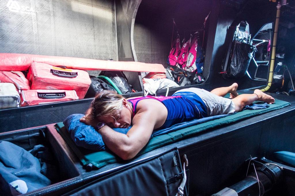 February 23, 2015. Leg 4 to Auckland onboard Team SCA.  Day 15. Liz Wardley rests below deck during her off watch hours. photo copyright Anna-Lena Elled/Team SCA taken at  and featuring the  class