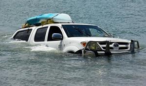 Man's kayak ride in Noosa River goes awry as his car slips in too. photo copyright Geoff Potter / Sunshine Coast Daily taken at  and featuring the  class