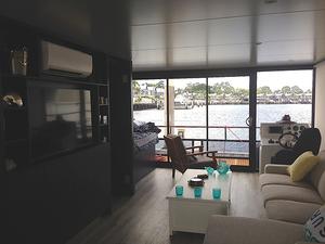 Air-conditioning and a massive TV ensures everyone enjoys their time aboard the Havana Houseboats 45ft Entertainer photo copyright Emma Milne taken at  and featuring the  class
