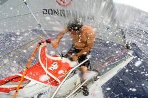 Dongfeng Race Team - Eric Peron on the bow - Volvo Ocean Race 2014-15 photo copyright Sam Greenfield/Dongfeng Race Team/Volvo Ocean Race taken at  and featuring the  class