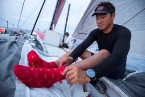 Dongfeng Race Team - Jin Hao Chen 'Horace' will wear these lucky red socks - Volvo Ocean Race 2014-15 photo copyright Sam Greenfield/Dongfeng Race Team/Volvo Ocean Race taken at  and featuring the  class