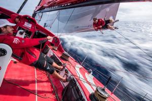 Dongfeng Race Team - Kevin Escoffier is done checking the leech line so Thomas Rouxel pulls him in - Leg 4 to Auckland -  Volvo Ocean Race 2015 photo copyright Sam Greenfield/Dongfeng Race Team/Volvo Ocean Race taken at  and featuring the  class