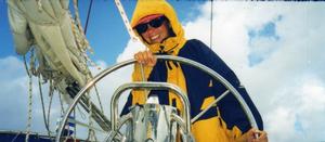 Julie at the helm - Ocean Cruising Adventures Series photo copyright Bluewater Cruising Association taken at  and featuring the  class