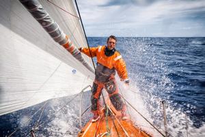 Team Alvimedica - Out of the doldrums,the pace quickens for the fleet on the race south to a light-wind trough of low pressure and the Vanuatu wind shadow. Nick Dana on the bow during a sail change - Volvo Ocean Race 2014-15 photo copyright  Amory Ross / Team Alvimedica taken at  and featuring the  class