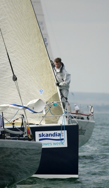 A bowman onboard Danebury keeps a close look-out as boats jostle for space in the Class 0 start, on the last day of racing at Skandia Cowes Week.<br />
 © onEdition http://www.onEdition.com