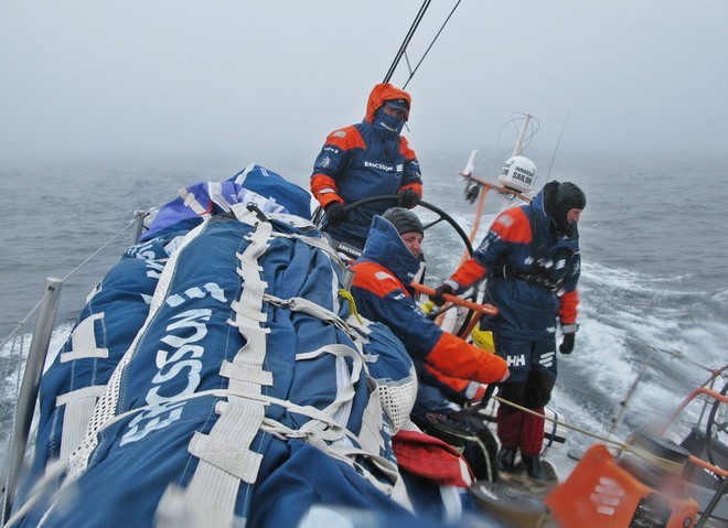 Richard Mason helming in the cold misty conditions, on leg 7 from Boston to Galway<br />
 © Gustav Morin/Ericsson Racing Team/Volvo Ocean Race http://www.volvooceanrace.org