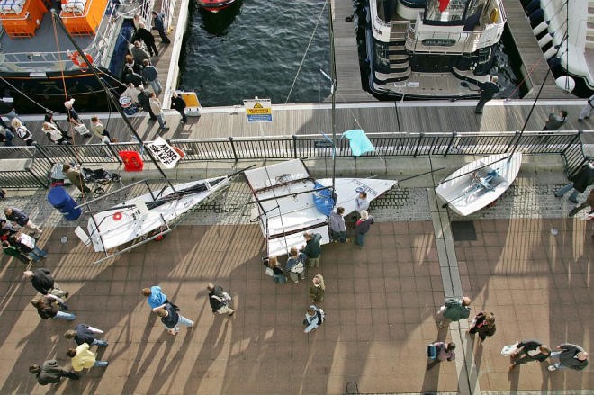 Dockside crowds in the sun at the Collins Stewart London Boat Show © onEdition http://www.onEdition.com