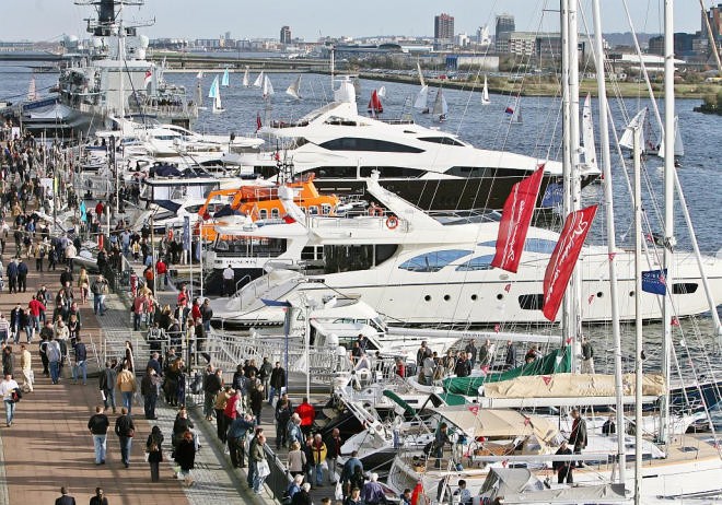 Dockside crowds in the sun at Collins Stewart London Boat Show. © onEdition http://www.onEdition.com