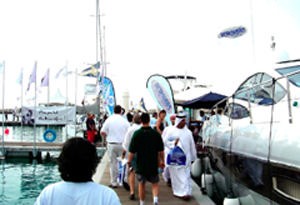 Checking out boats on display at the Dubai International Boat Show photo copyright Dubai World Trade Centre taken at  and featuring the  class
