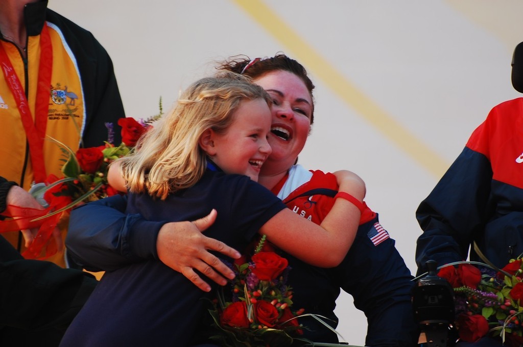 Maureen Mckinnon-Tucker is hugged by her daughter - 2008 Paralympics - Qingdao photo copyright Dan Tucker http://sailchallengeinspire.org/ taken at  and featuring the  class