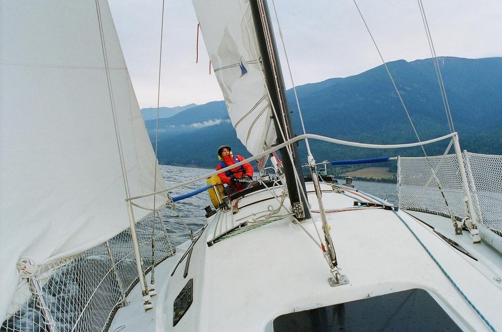 Skipper David Oosthuizen aboard Makai enroute to Kuskanook Harbour on Kootenay Lake, BC - Kootenay Lake Grain Sailing © Jon Steinman
