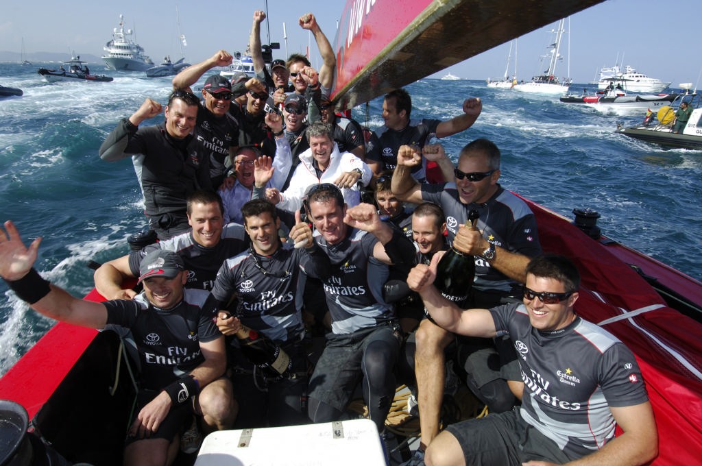 Emirates Team New Zealand crew celebrate with Yves Carcelle (white jacket, centre), the President and CEO of Louis Vuitton and Bruno Trouble aboard NZL92 after their 5 - 0 win of the Louis Vuitton Cup finals. 6/6/2007 © Emirates Team New Zealand / Photo Chris Cameron ETNZ 