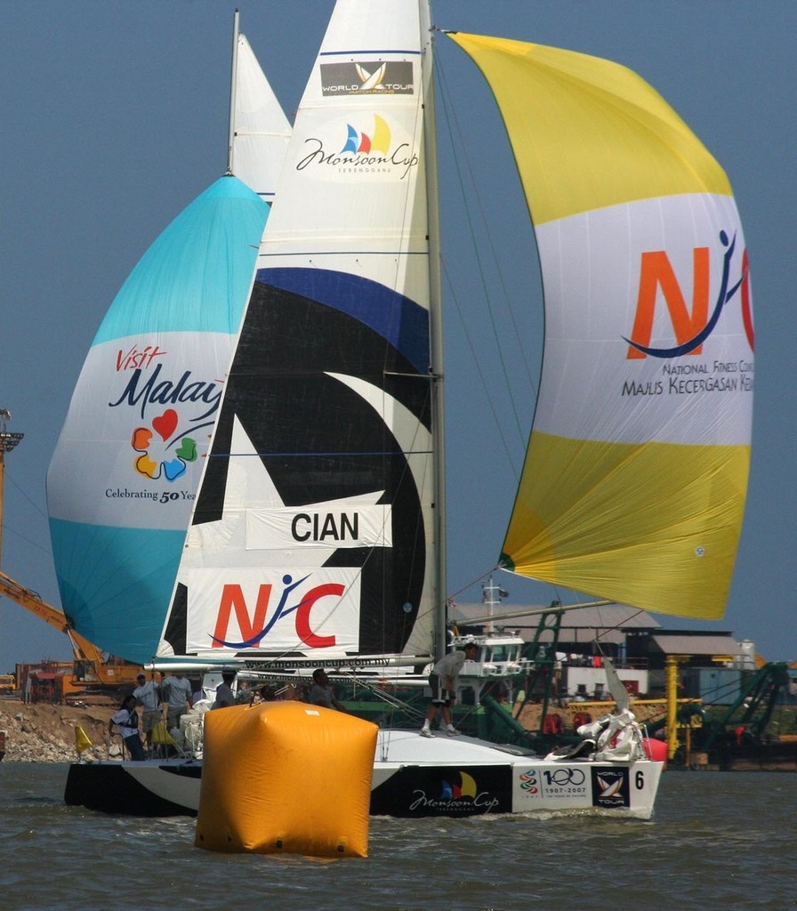 Cian (foreground) with Williams (blue kite) at mark in semi final - Monsoon Cup photo copyright Sail-World.com /AUS http://www.sail-world.com taken at  and featuring the  class