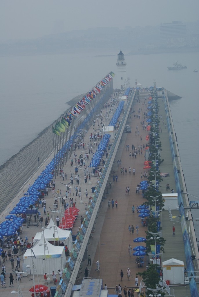 2008 Olympic Regatta - Qingdao - Day 6 - amazing the number of people walking the seawall in fog photo copyright Richard Gladwell www.photosport.co.nz taken at  and featuring the  class