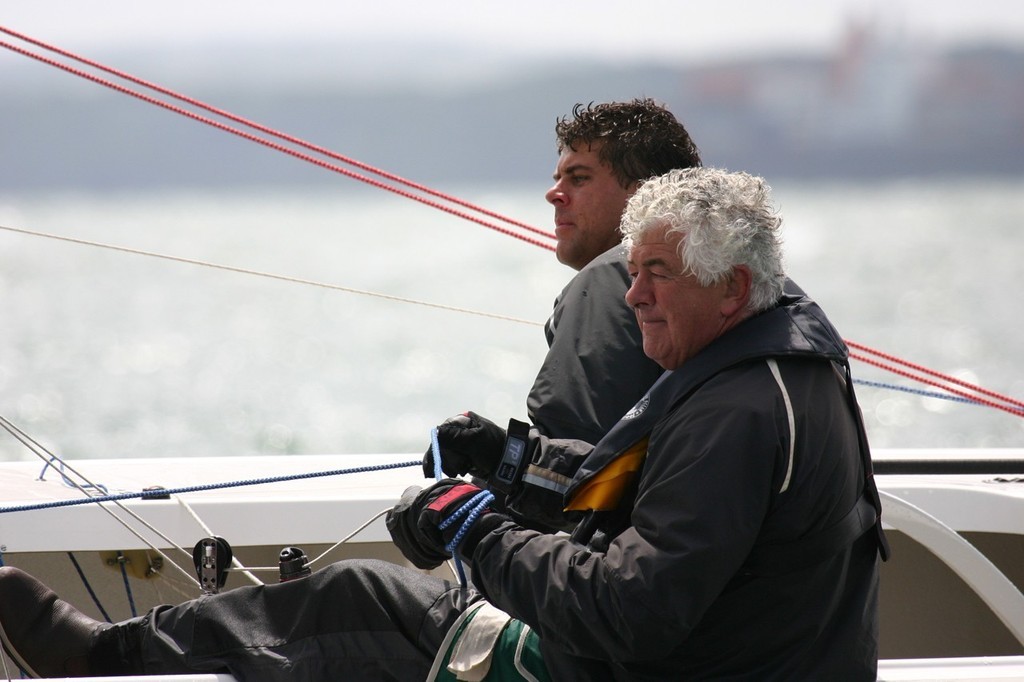 2007 Etchells World Championship, hosted by the Royal Corinthian Yacht Club, Cowes.  Day 3 - David and Richard (foreground) Burrows roll it to weather downwind. © Fiona Brown http://www.fionabrown.com