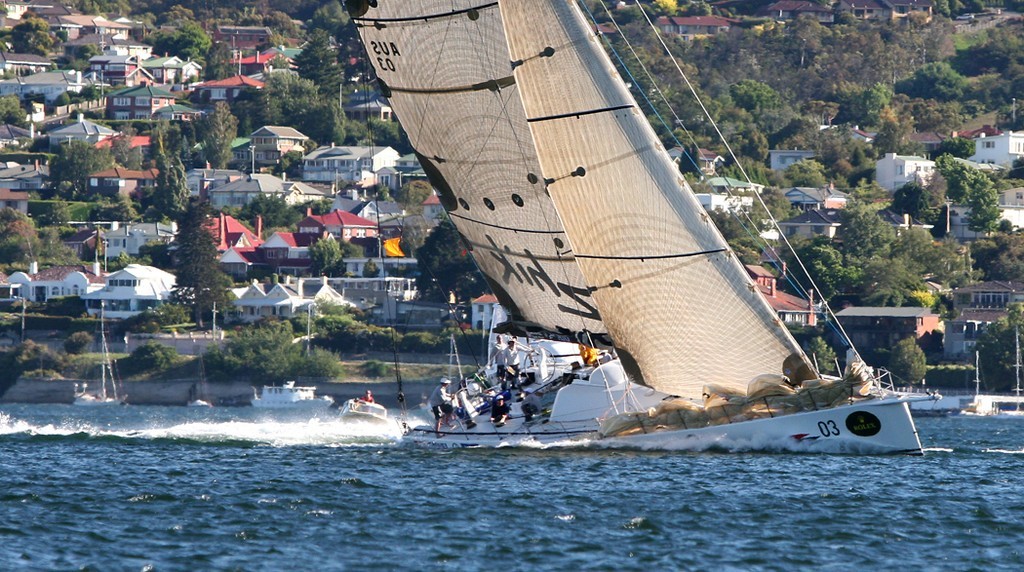Ichi Ban powers to the finish - Rolex Sydney Hobart Yacht Race photo copyright Crosbie Lorimer http://www.crosbielorimer.com taken at  and featuring the  class