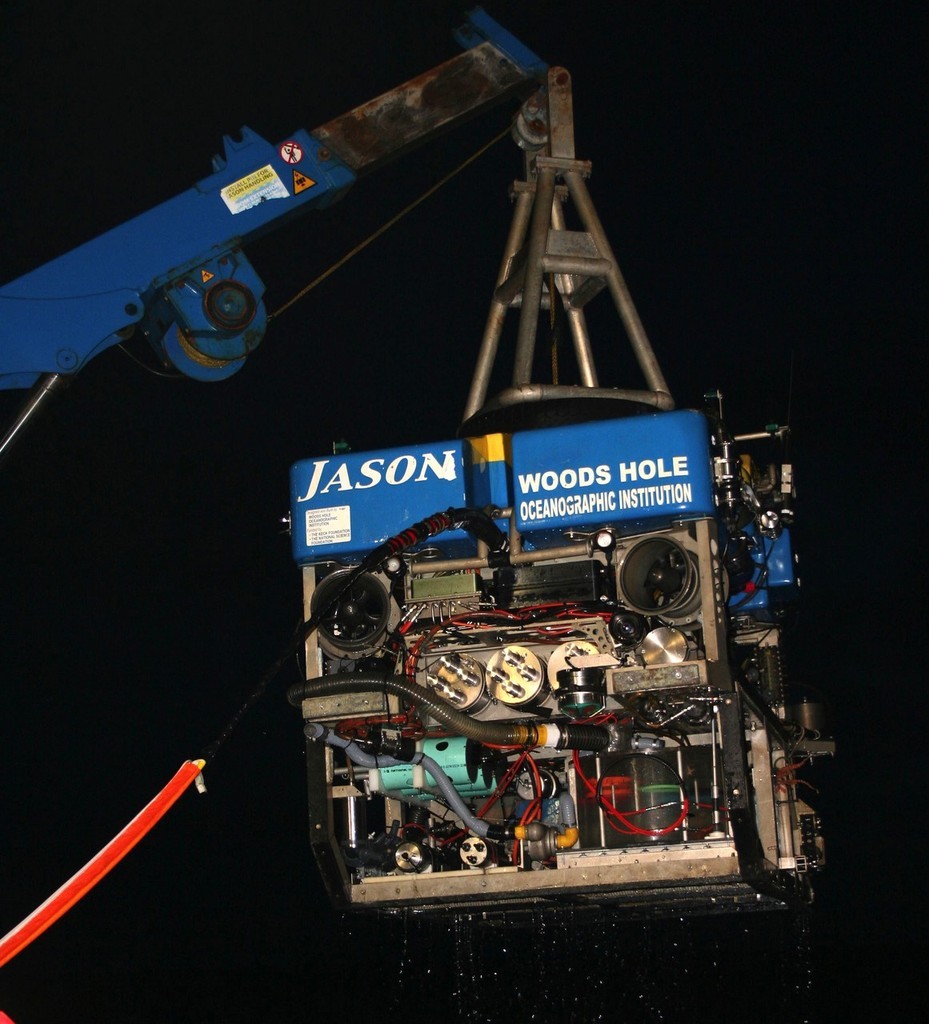 The remotely operated submersible Jason being recovered on board the RV Thompson. The red cable is the photo-electronic tether to the ship, which controls operations and sends images and data back to the ship. photo copyright  Copyright CSIRO Australia http://www.csiro.au taken at  and featuring the  class