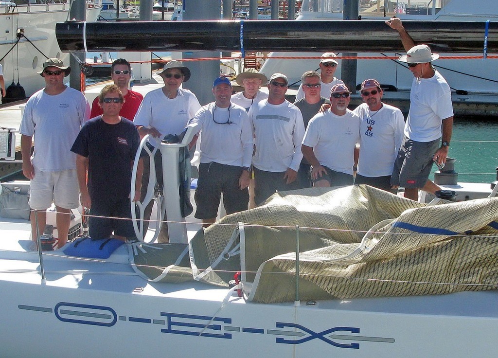 2008 Long Beach to Cabo San Lucas International Yacht Race - Peter Tong and crew of OEX gather on-deck for a victory photo after breaking the Cabo race record and finishing second overall on corrected handicap time. (Photo credit: Michael Stuart) photo copyright  SW taken at  and featuring the  class