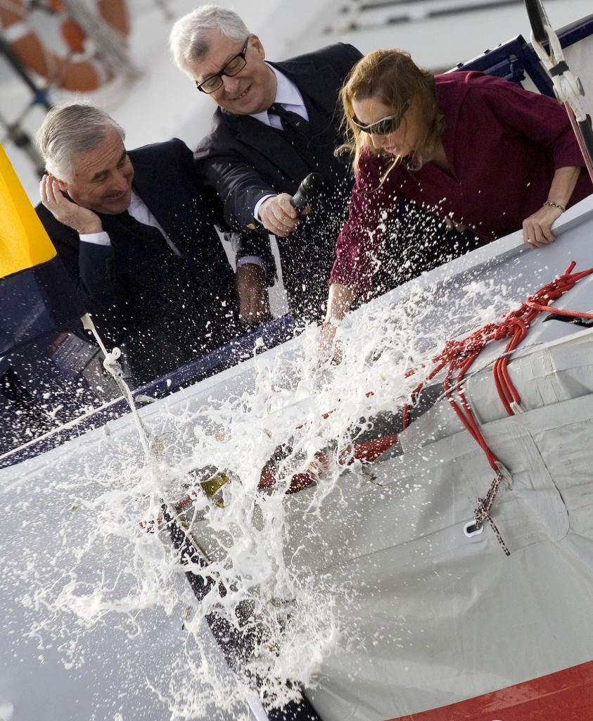 Miuccia Prada smashes a bottle of Gran Cuvée Brut 2002, a Franciacorta from the Bellavista wine cellars, on the bow of the new boat, with her husband Patrizio Bertelli at her side. photo copyright Luna Rossa Challenge 2007 S.L.@ Carlo Borlenghi taken at  and featuring the  class