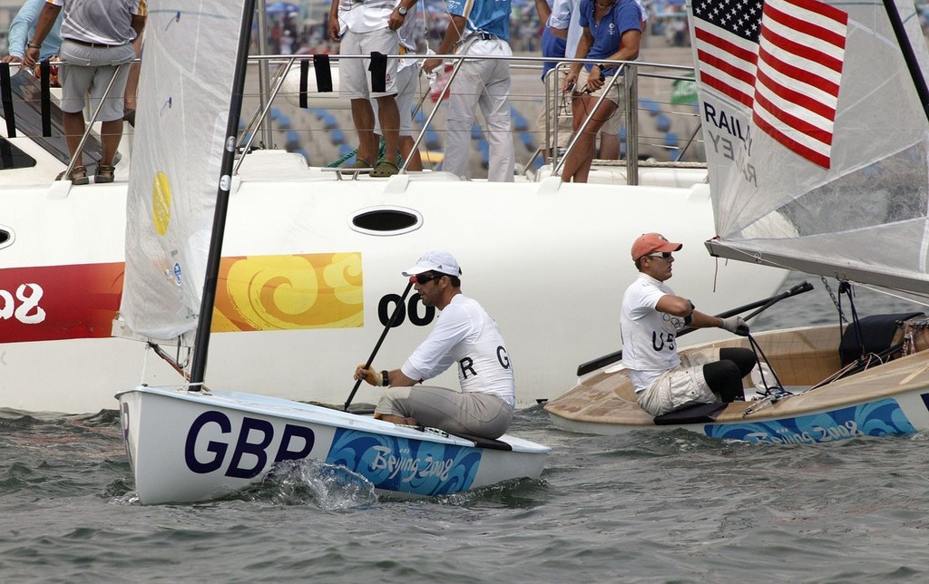 Qingdao Olympic Regatta 2008. Ainslie (GBR) and Railey (USA) definitely not talking to each other today. Finn Medal Race (abandoned). photo copyright Guy Nowell http://www.guynowell.com taken at  and featuring the  class