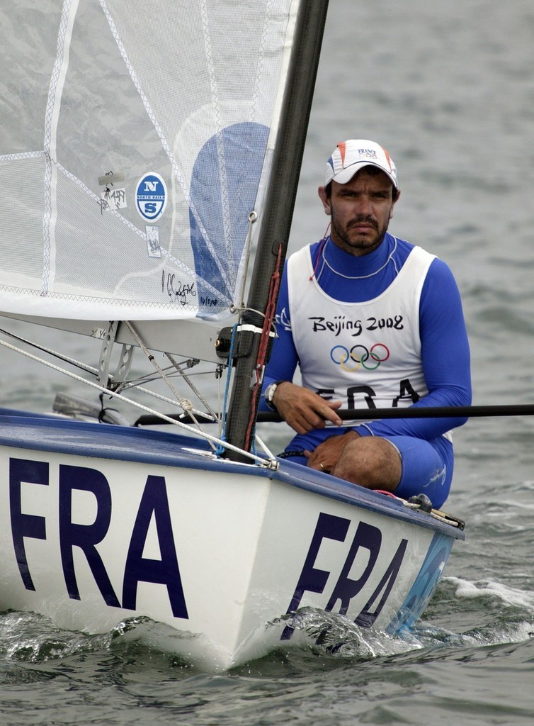 Qingdao Olympic Regatta 2008. Days of Thunder. Concentration from Guillaume Florent (FRA) before the start of the Finn Medal Race (abandoned). photo copyright Guy Nowell http://www.guynowell.com taken at  and featuring the  class