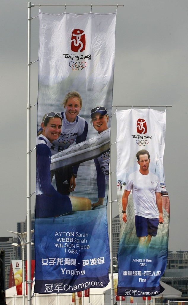 Qingdao Olympic Regatta 2008. Champions' flags. GBR Golden Girls and Ben Ainslie. photo copyright Guy Nowell http://www.guynowell.com taken at  and featuring the  class
