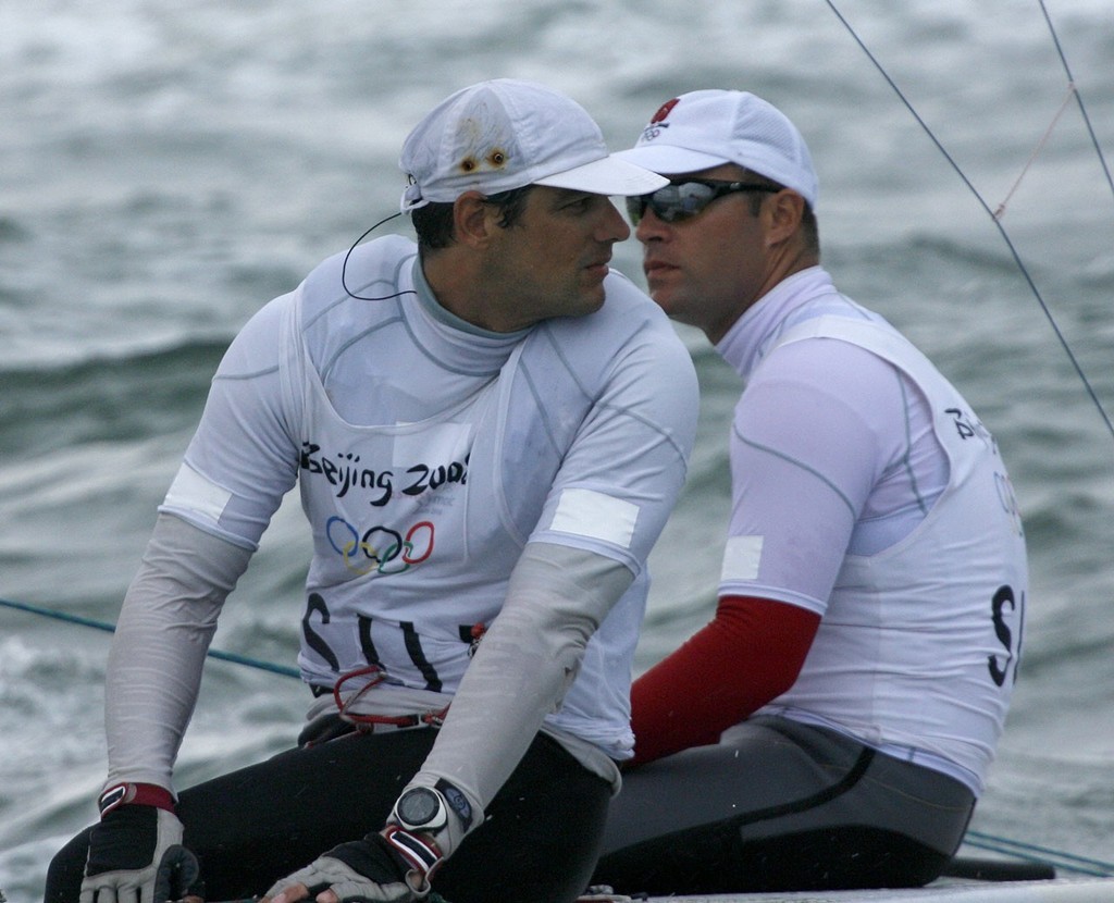 Qingdao Olympic Regatta 2008. Star medal race. Marazzi and De Maria (SUI) ``Go on, give us a kiss`` photo copyright Guy Nowell http://www.guynowell.com taken at  and featuring the  class