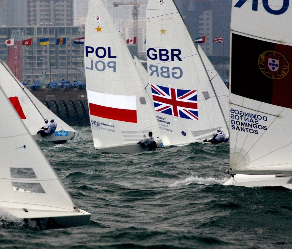 Qingdao Olympic Regatta 2008. Star medal race. Percy and Simpson (GBR) gold medallists in the middle of the pack. © Guy Nowell http://www.guynowell.com