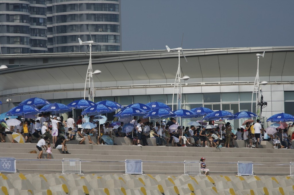 Qingdao Olympic Regatta 2008. Spectators in front of the Media Centre. photo copyright Guy Nowell http://www.guynowell.com taken at  and featuring the  class