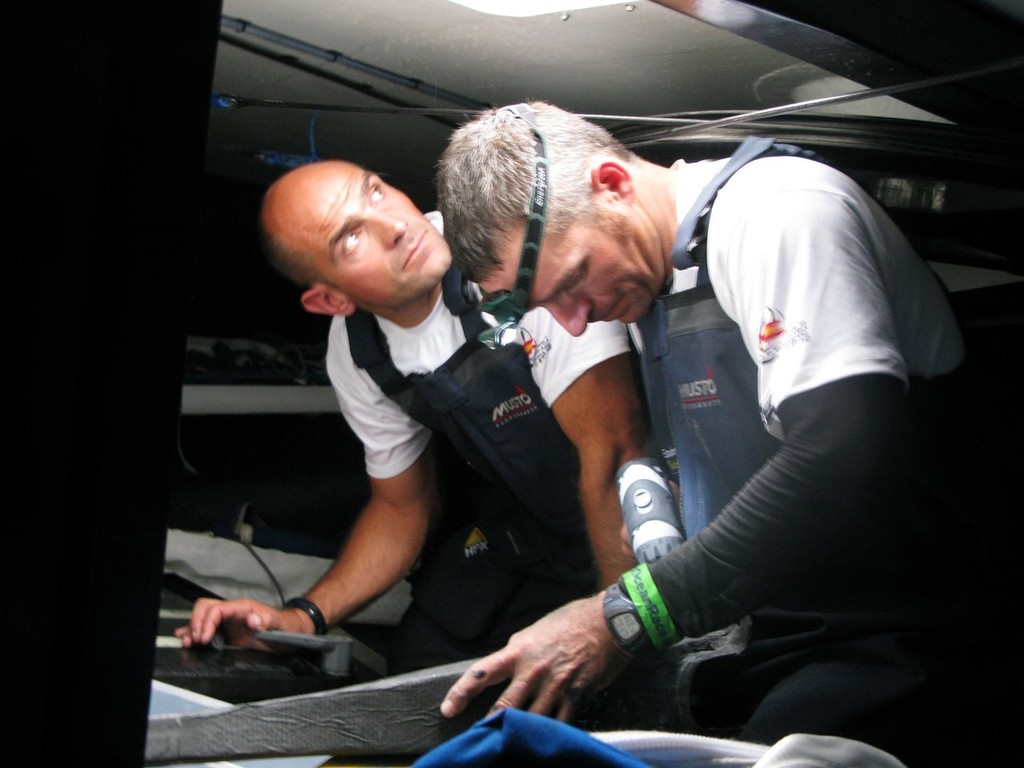 (l-r) Xabier Fernandez and Pepe Ribes attempt to repair steering damage to Telefonica Blue which occured shortly after the start of leg 1. photo copyright Gabriele Olivo/Telefonica Blue/Volvo Ocean Race http://www.volvooceanrace.org taken at  and featuring the  class