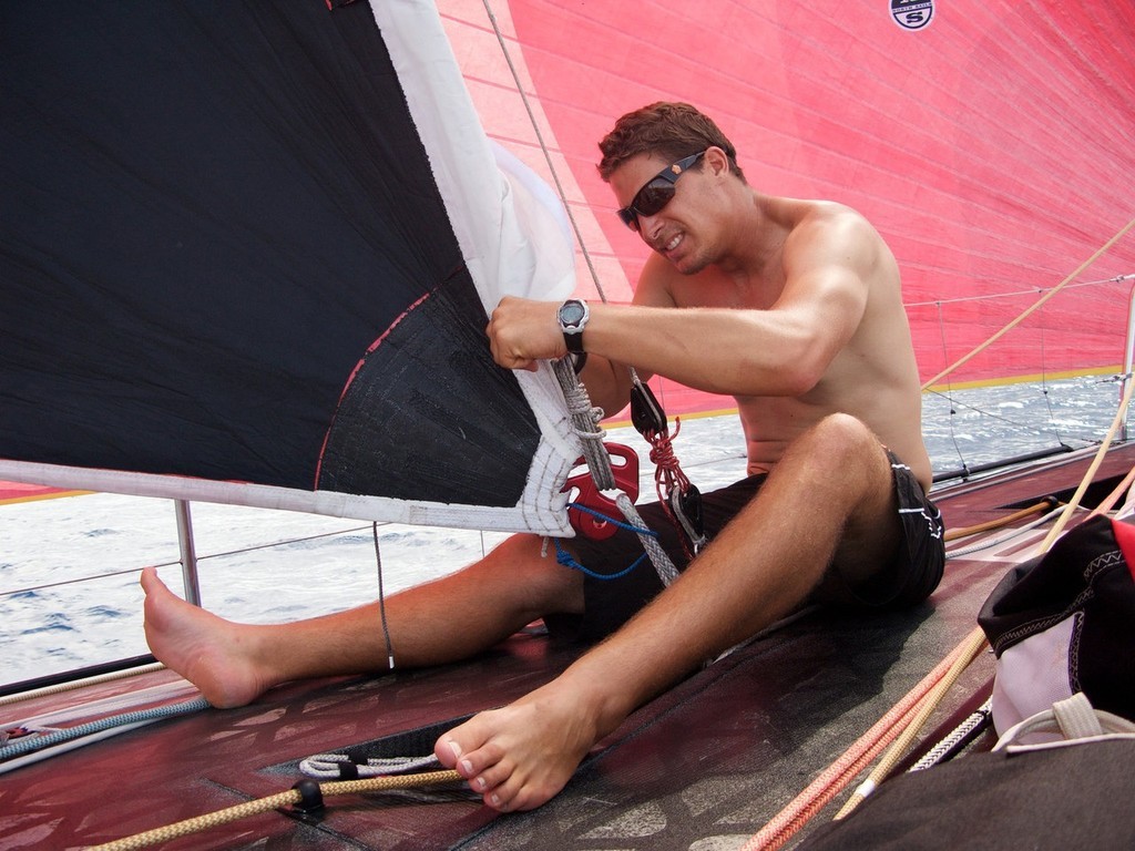 Photo: Rick Deppe/PUMA Ocean Racing. Justin Ferris (NZL) checks the sails onboard PUMA Ocean Racing’s il mostro on leg 1 of the Volvo Ocean Race

 photo copyright Volvo Ocean Race http://www.volvooceanrace.com taken at  and featuring the  class