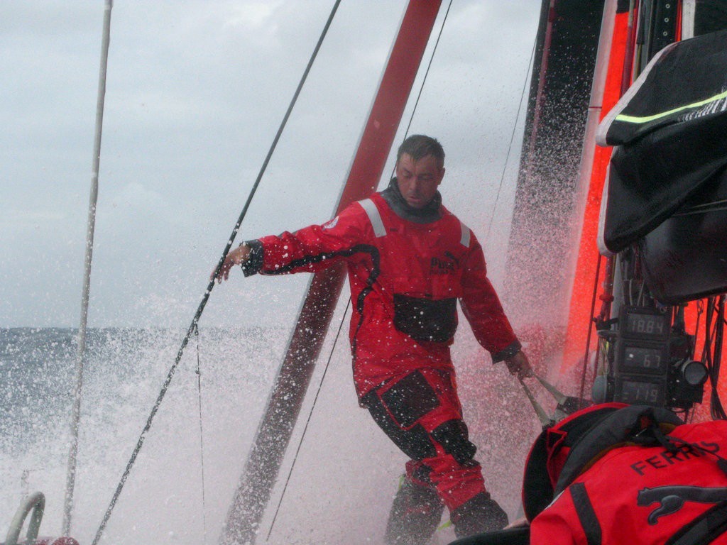 Helmsman / Trimmer Rob Greenhalgh (GBR) drags a sailbag along the deck of PUMA in heavy weather during Leg 5 of the Volvo Ocean Race 2008-09 from Qingdao to Rio de Janeiro. © Rick Deppe/PUMA Ocean Racing/Volvo Ocean Race http://www.volvooceanrace.org