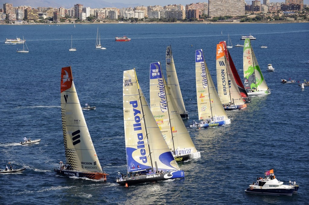 The fleet of 8 Volvo Open 70ís power away from the start line on the first Volvo Ocean Race in-port race in Alicante, Spain. photo copyright Rick Tomlinson/Volvo Ocean Race http://www.volvooceanrace.com taken at  and featuring the  class