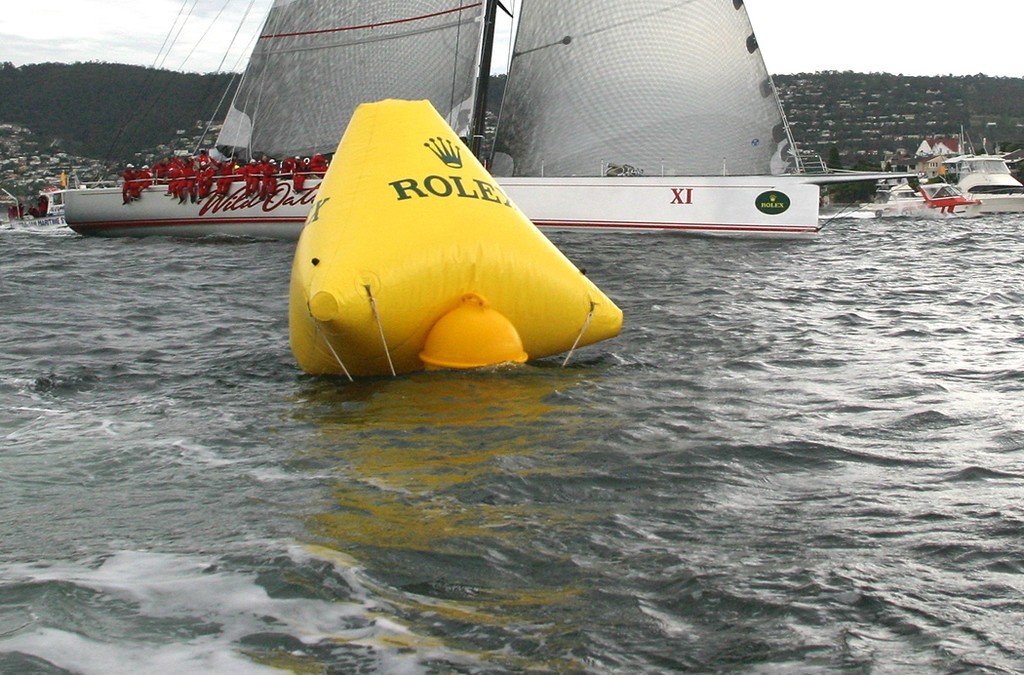 Wild Oats XI crossing the line - Rolex Sydney Hobart Yacht Race 2007 photo copyright Crosbie Lorimer http://www.crosbielorimer.com taken at  and featuring the  class