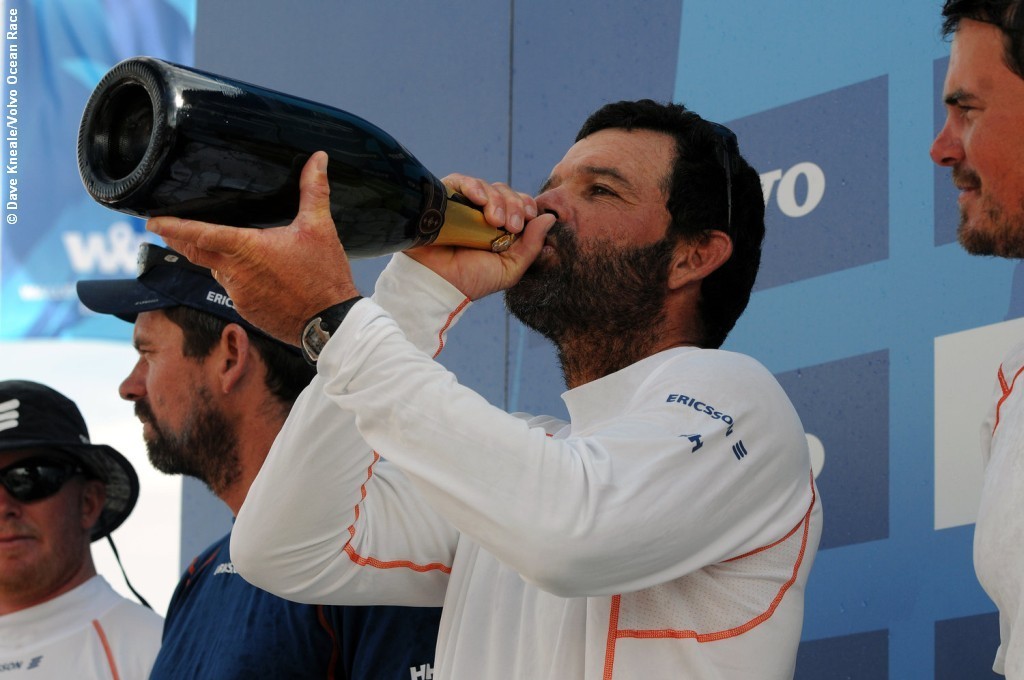 Ericsson 4 Skipper Torben Grael drinking champagne on stage after Leg 1 VOR photo copyright  David Kneale/Volvo Ocean Race http://www.volvooceanrace.com/ taken at  and featuring the  class