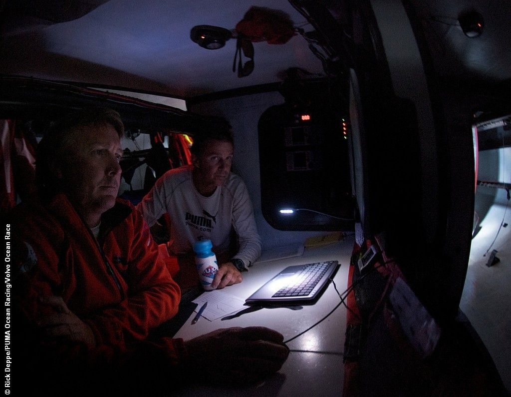 Navigator Andrew Cape and skipper Ken Read discuss tactics as they head towards Cape Town, on leg 1 of the Volvo Ocean Race © Rick Deppe/PUMA Ocean Racing/Volvo Ocean Race http://www.volvooceanrace.org