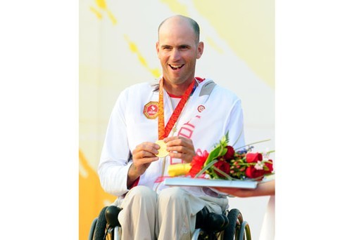 Paul Tingley of Canada accepts his gold medal in the 2.4 Metre event  - 2008 Paralympics - Qingdao © Sailing2008.com