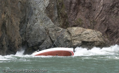 Savage Beauty on the rocks in San Francisco - she swings back side on in the next set of swells and drives into the rocks - the crew are still aboard. © Erik Simonson/ h2oshots.com