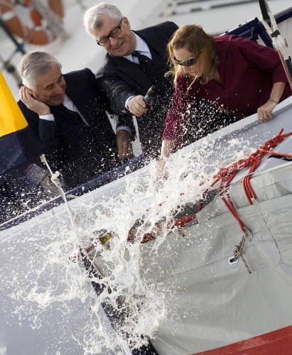 Miuccia Prada smashes a bottle of Gran Cuvée Brut 2002, a Franciacorta from the Bellavista wine cellars, on the bow of the new boat, with her husband Patrizio Bertelli at her side. © Luna Rossa Challenge 2007 S.L.@ Carlo Borlenghi