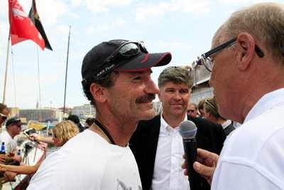 Skipper of Pirates of the Caribbean, Paul Cayard, is interviewed dockside after winning Leg 9 of the Volvo Ocean Race 2005-6 into Gothenburg. Volvo Ocean Race CEO Glenn Bourke looks on. ©Paul Todd/Outside Images  © Volvo Ocean Race/Paul Todd