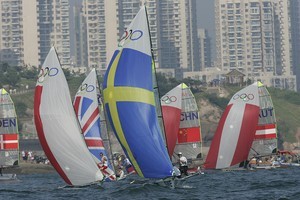 The 49er fleet under spinnaker - 2008 Olympics Qingdao photo copyright Ingrid Abery http://www.ingridabery.com taken at  and featuring the  class