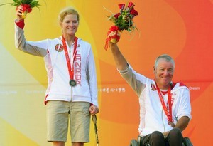 Stacie Louttit and John McRoberts of Canada accept their bronze medal in the SKUD18 sailing event
 - 2008 Paralympics - Qingdao photo copyright Sailing2008.com taken at  and featuring the  class