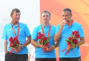 Bruno Jourdren (L), Nicholas Vimont-Vicary and Herve Larhant (R) of France accept their silver medal in the Sonar event
 - 2008 Paralympics - Qingdao photo copyright Sailing2008.com taken at  and featuring the  class