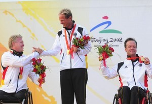 Siegmund Mainka (L), Jens Kroker and Robert Prem (R) of Germany celebrate winning the Paralympic gold medal in the Sonar
 - 2008 Paralympics - Qingdao photo copyright Sailing2008.com taken at  and featuring the  class